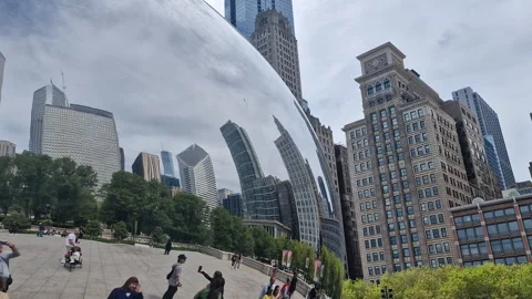 Chicago USA, Cloud Gate aka The Bean Landmark and Reflections of People and Stock Footage 326277513