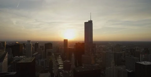 Chicago - View of Skyline and River from Rooftop Sunset Tilt - 6K Slow Motion Stock Footage 88532530