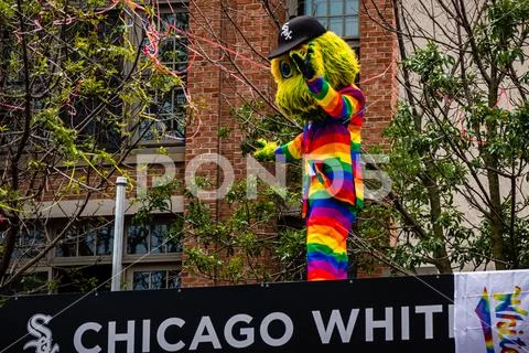 Chicago White Sox mascot Southpaw wearing a rainbow suit at Gay Pride parade Stock Photos