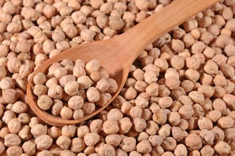 Chick-peas  in a spoon Stock Photos