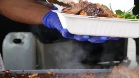 Chicken and beef brisket bbq at street food market Stock Footage 285166279