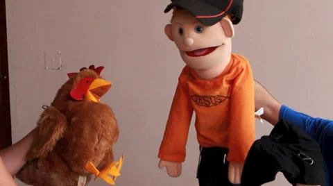 Chicken and boy puppets talking Stock Footage 39106161