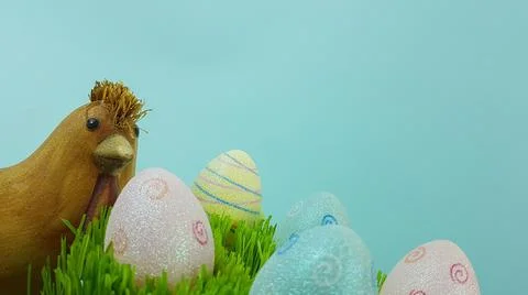 Chicken and easter eggs on a bright background Stock Photos