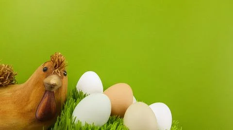 Chicken and easter eggs on a bright background Stock Photos