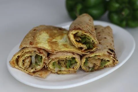 Chicken and egg wrap or Egg chicken roll. Stir fried bell peppers and mince.. 写真素材