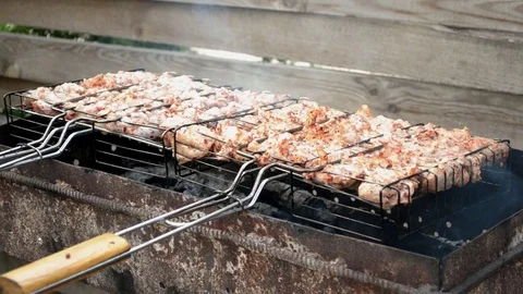 Chicken appetizing meat is fried on grill Stock Footage 112433990