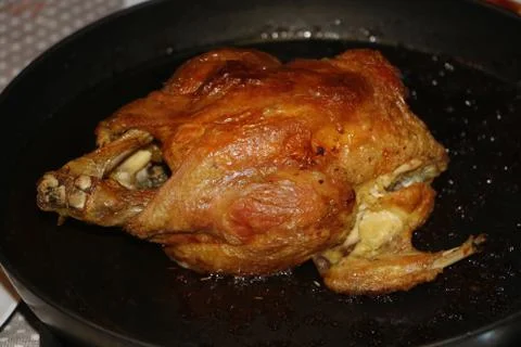 Chicken baked in the oven Stock Photos