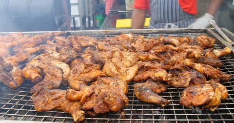 Chicken barbeque on charcoal grill Video stock 67109277