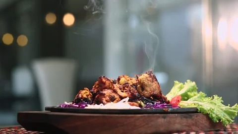 Chicken BBQ With Smoke on Round Table Cafe Background Stock Footage 200956072