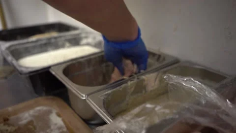 Chicken Being Breaded In Kitchen Stock Footage 146228460