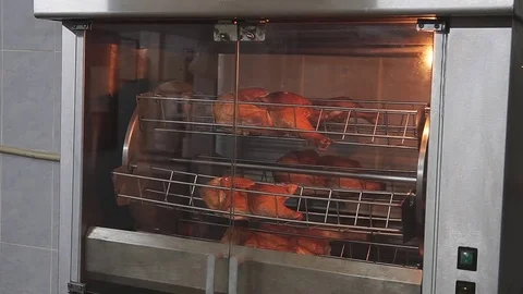 Chicken being cooked over coal Stock Footage 83794102