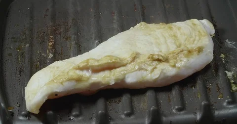 Chicken being grilled Stock Footage 92178275