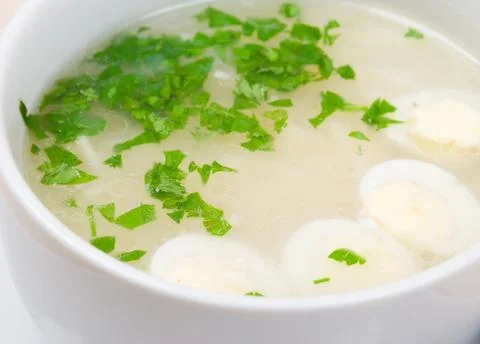 Chicken bouillon with egg Foto stock
