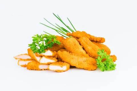 Chicken Breaded Fillet. Breaded chicken nuggets. Fast homemade food at home Stock Photos