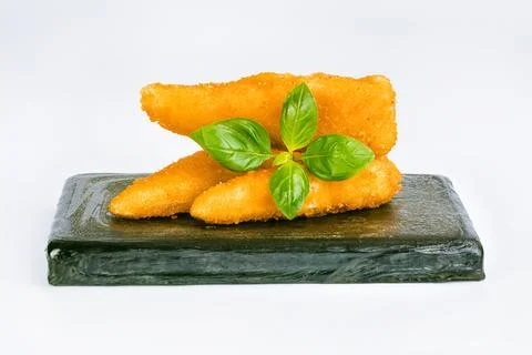 Chicken Breaded Fillet. Breaded chicken nuggets. Fast homemade food at home Stock Photos
