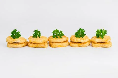 Chicken Breaded Fillet. Breaded chicken nuggets. Fast homemade food at home Stock Photos