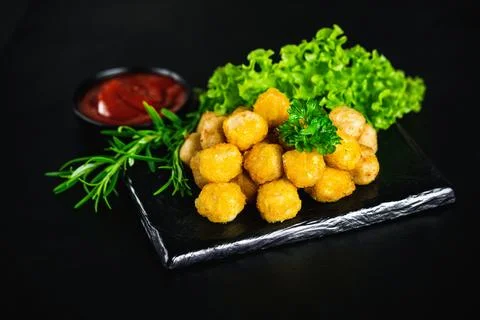 Chicken Breaded Raw Meat.Semifinished Breaded chicken nuggets from chicken Stock Photos
