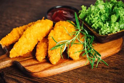 Chicken Breaded Raw Meat.Semifinished Breaded chicken nuggets from chicken Stock Photos