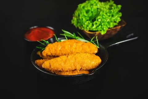 Chicken Breaded Raw Meat.Semifinished Breaded chicken nuggets from chicken Stock Photos