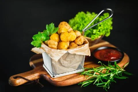 Chicken Breaded Raw Meat.Semifinished Breaded chicken nuggets from chicken Foto stock