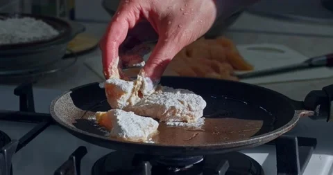 Chicken breading in flour 4k slow mo Stock Footage 150758958
