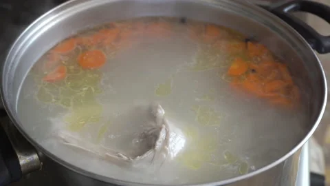 Chicken broth is cooked Stock Footage 240022741