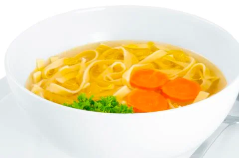 Chicken broth on white background. Фото