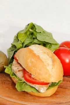 Chicken in a bun Stock Photos