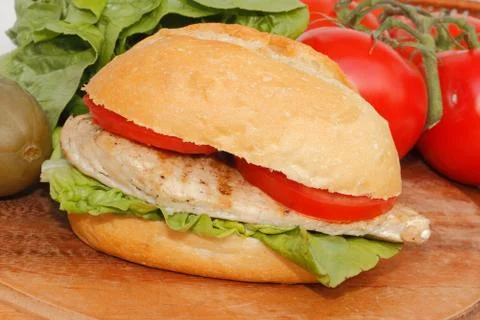 Chicken in a bun Stock Photos