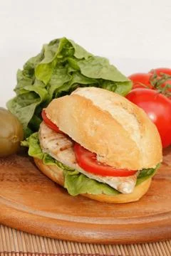 Chicken in a bun Stock Photos