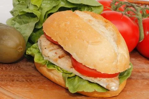 Chicken in a bun Stock Photos