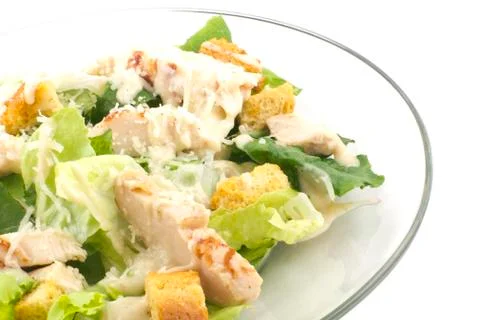 Chicken caesar salad isolated on white Stock Photos