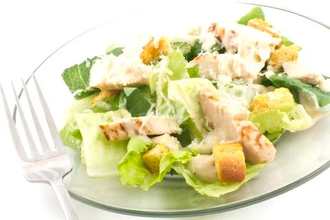 Chicken caesar salad isolated on white Stock Photos
