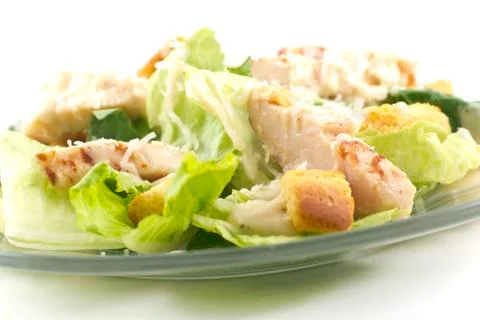 Chicken caesar salad isolated on white Stock Photos