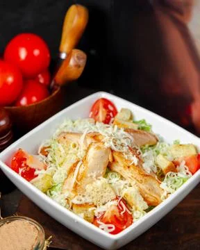 Chicken caesar salad in the plate Stock Photos