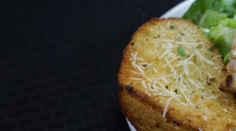 Chicken Caesar Salad served with Toasted Bread Stock Footage 40272296