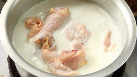Chicken with coconut milk curry  , Thai famous food Stock Footage 134371053