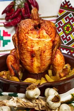 Chicken cooked in the oven on a ceramic base. 写真素材