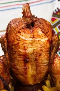Chicken cooked in the oven on a ceramic base. Stock Photos