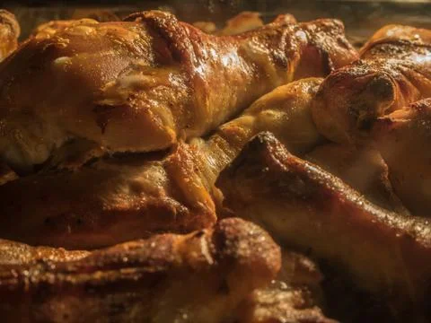 Chicken is cooked in the oven Stock Photos