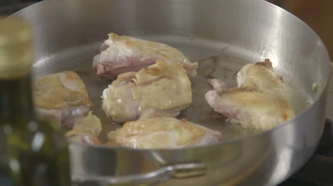 Chicken Cooking in Pan Stock Footage 27296673