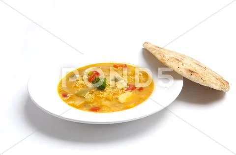 Chicken curry with naan Stock Photos