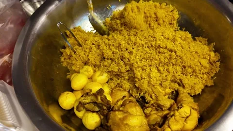 Chicken Curry Rice and Eggs Served in Plastic Container Stock-Footage 343763858