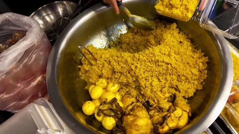 Chicken Curry Rice Being Served in a Plastic Takeaway Container 스톡 동영상 343763791