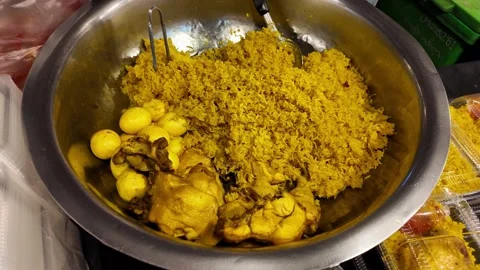 Chicken Curry with Spiced Rice in a Large Bowl Stock-Footage 343763813