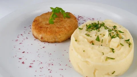 Chicken cutlet with mashed potatoes, served in Restaurant Stock Footage 95152651