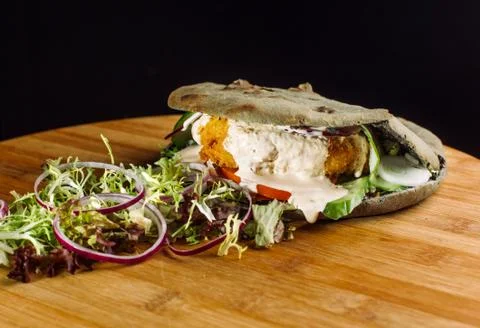 Chicken cutlet in roll. Photos