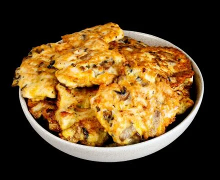 Chicken cutlets on black Stock Photos