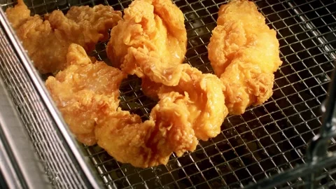 Chicken Deep-Fried at the Restaurant Stock Footage 323388713