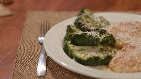 Chicken Dish with Broccoli Close Up Pan Right Stock Footage 81276881